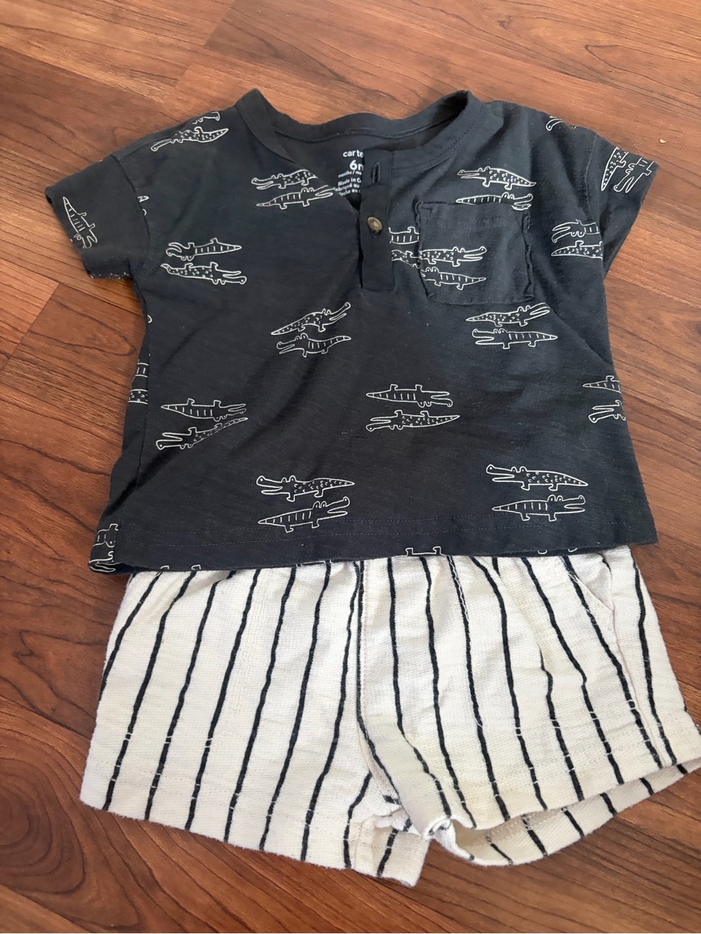 Carter's Black Henley Tee with White Alligator Print and Cream Striped Shorts